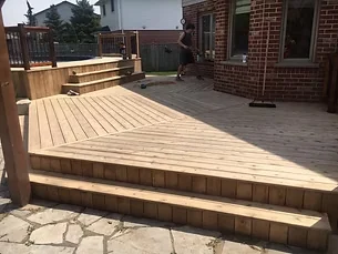 Prepared bare wood deck boards and steps ready for stain